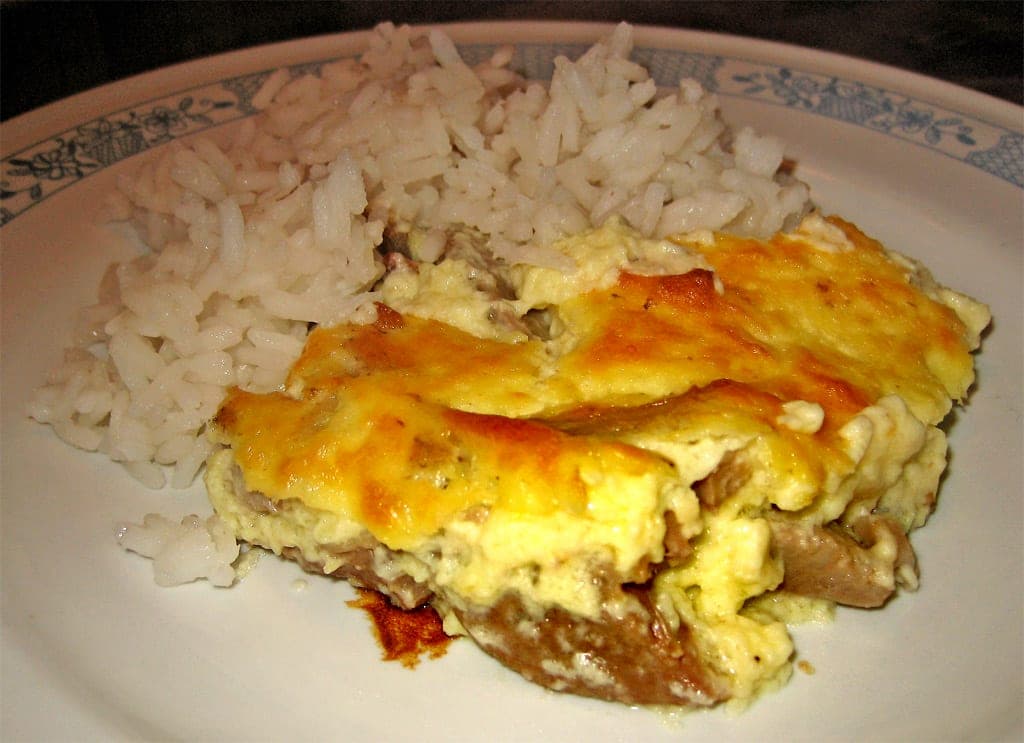 Tavë kosi served with rice pilaf